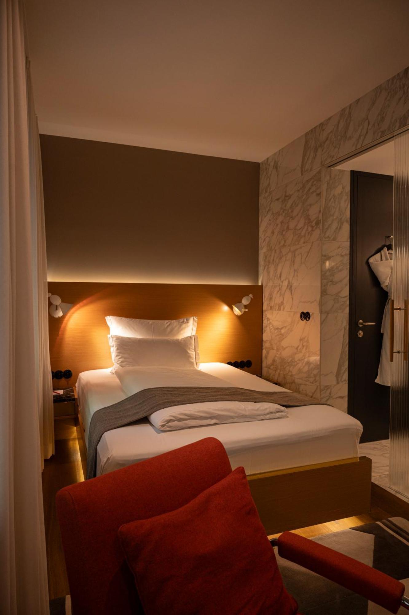 The Guesthouse Wina Bagian luar foto A bedroom at the hotel
